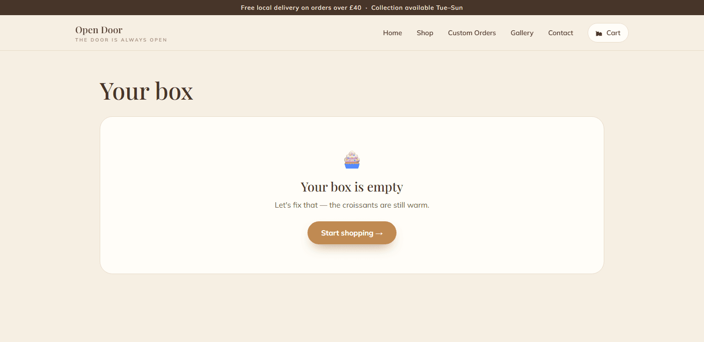 An empty basket, headed Your box, reading "Your box is empty — let's fix that, the croissants are still warm", with a button to start shopping.